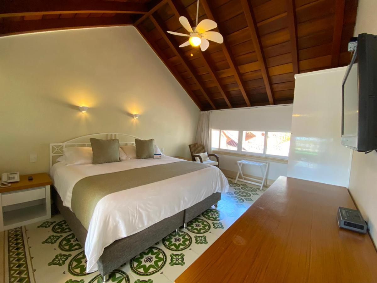 Hotel Las Americas Casa De Playa Cartagena Eksteriør billede A room at the hotel